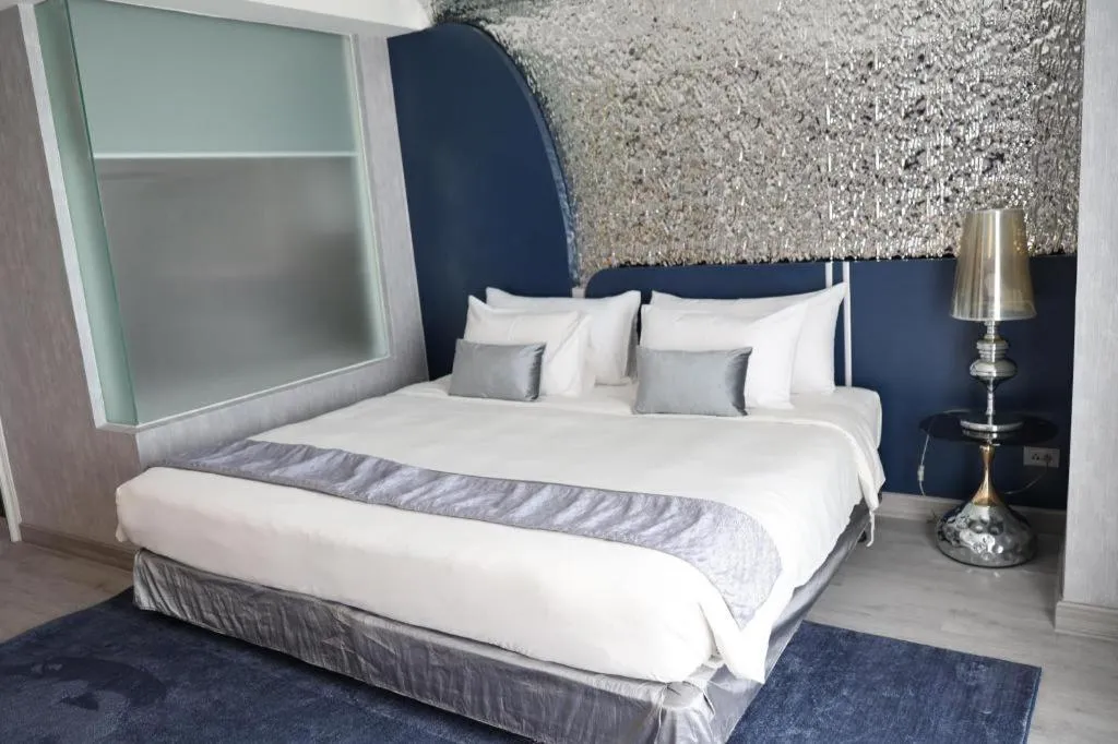 Bed in Glacier Hotel Khon Kaen