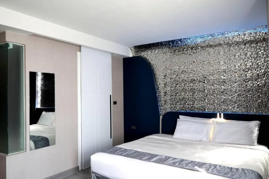 Bed in Glacier Hotel Khon Kaen