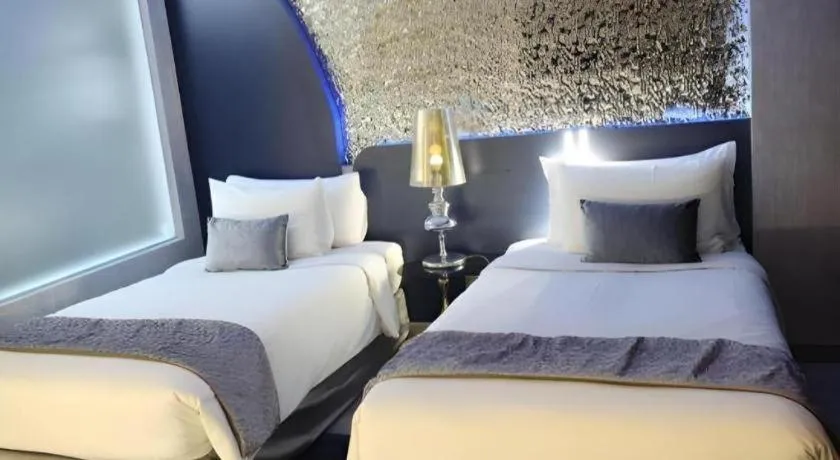 Bed in Glacier Hotel Khon Kaen