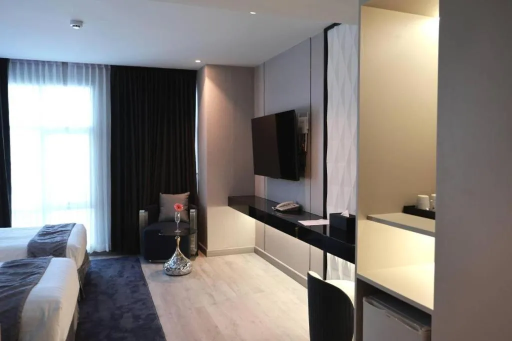 Bed in Glacier Hotel Khon Kaen