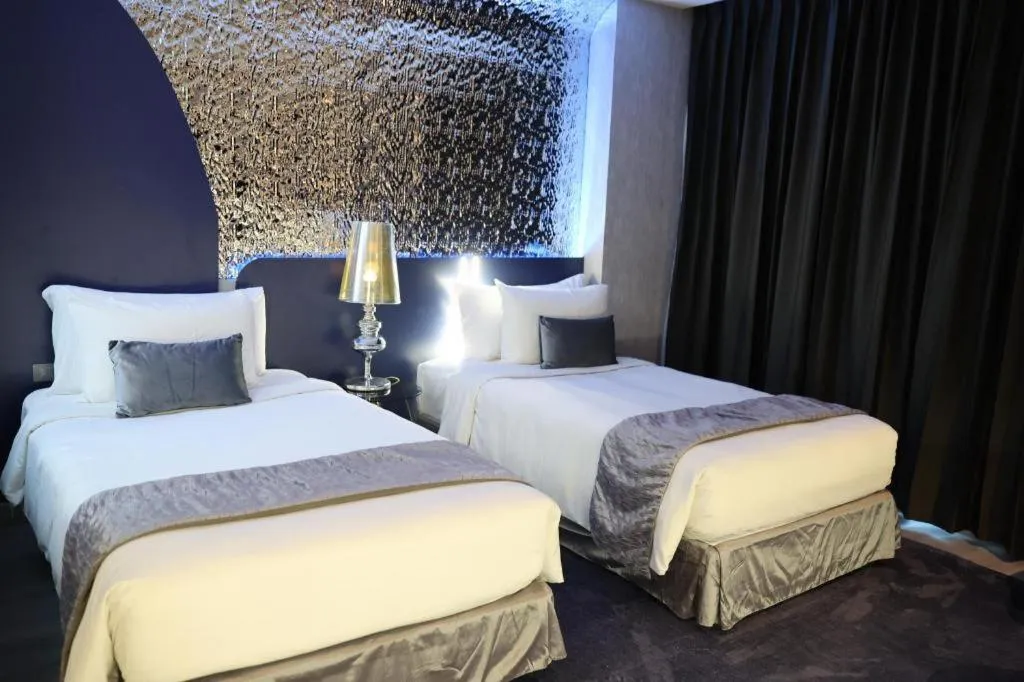 Bed in Glacier Hotel Khon Kaen