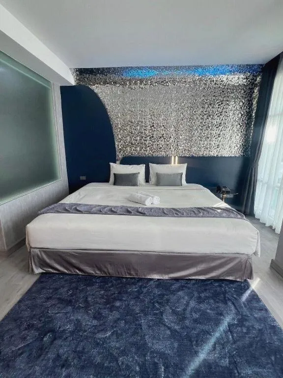 Bed in Glacier Hotel Khon Kaen