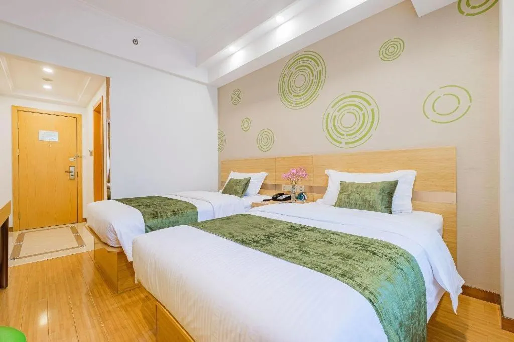 Bed in GreenTree Inn Shanghai Jingan Railway Station Xinzha Road Business Hotel