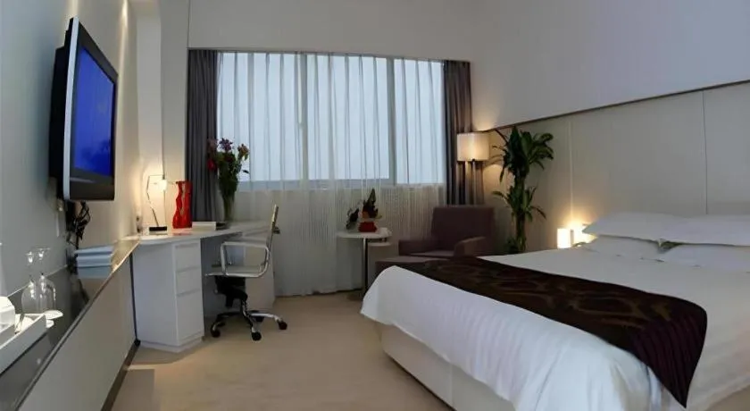 Bed in Ramada Plaza by Wyndham Hangzhou Riverside