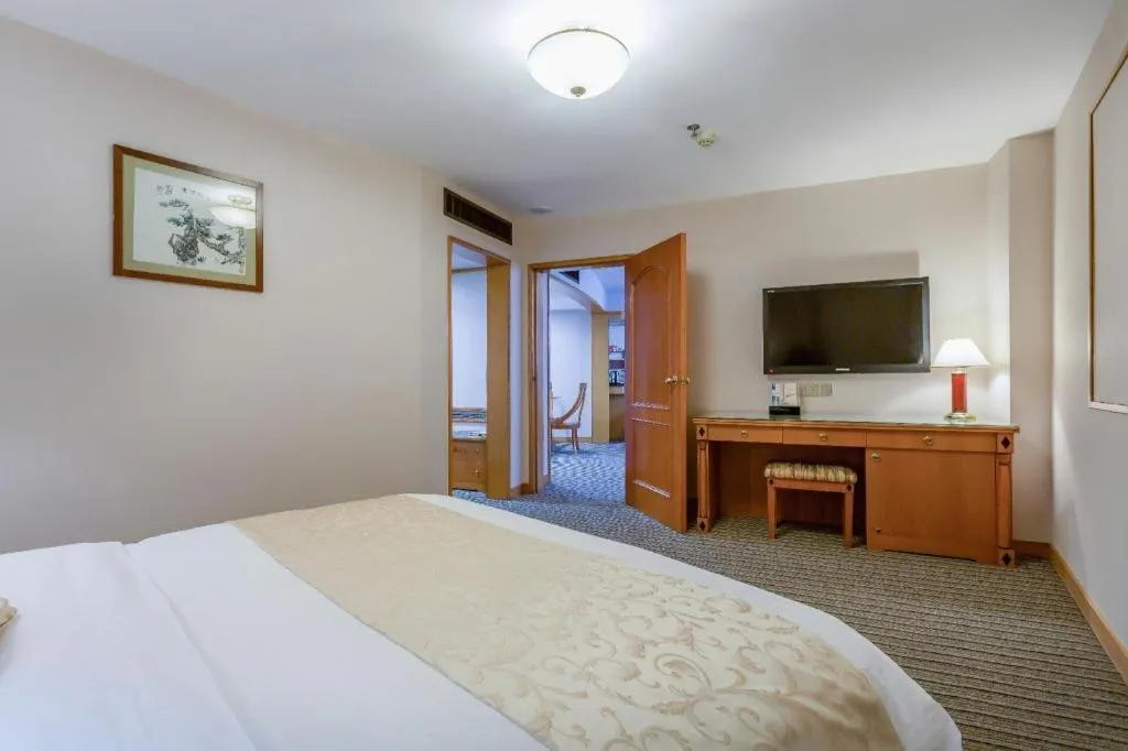 Bed in Wuhan Asia Hotel