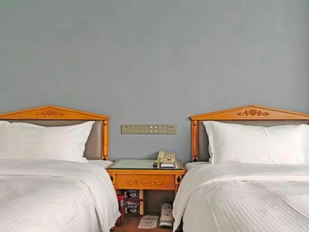 Bed in Wuhan Asia Hotel