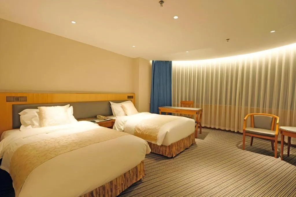 Bed in Wuhan Asia Hotel