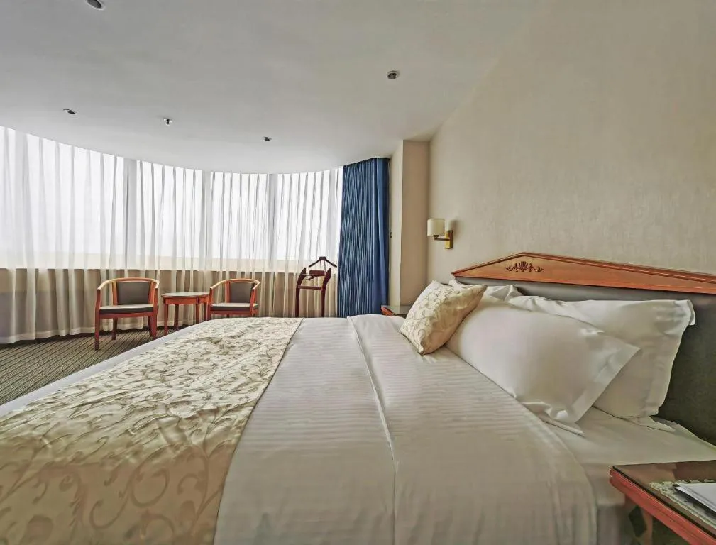 Bed in Wuhan Asia Hotel