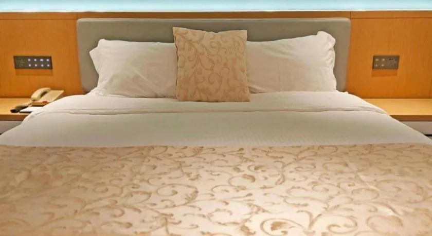 Bed in Wuhan Asia Hotel