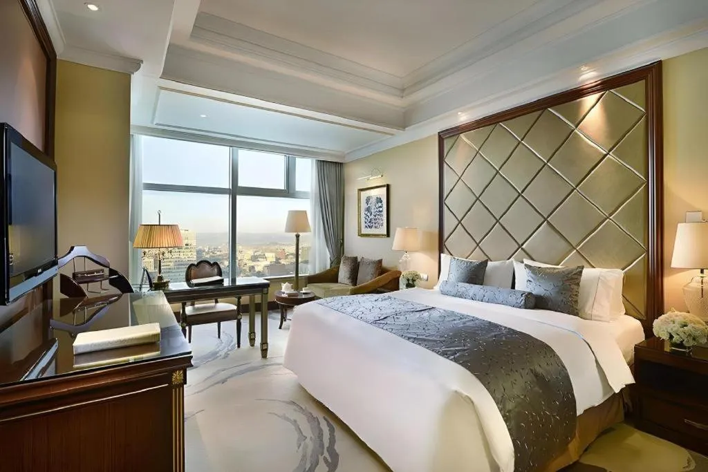 Bed in Beijing Liaoning Hotel