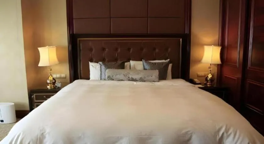Bed in Beijing Liaoning Hotel