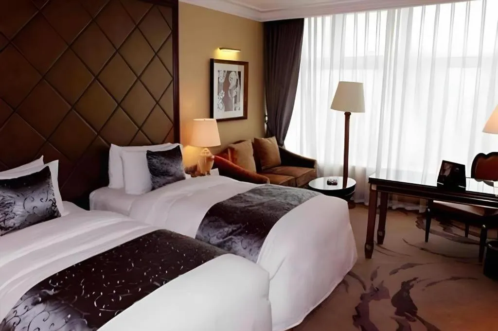 Bed in Beijing Liaoning Hotel