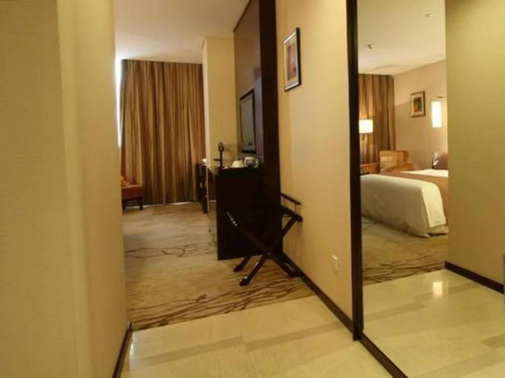 Bed in Beijing Liaoning Hotel