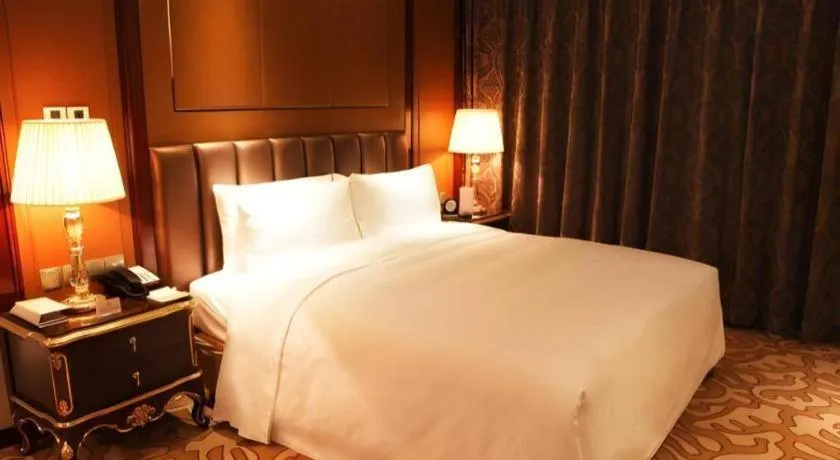 Bed in Beijing Liaoning Hotel