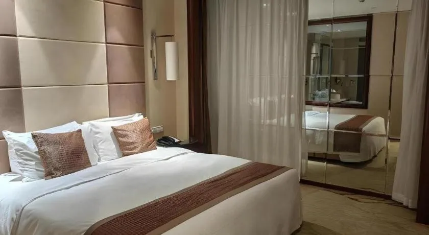 Bed in Beijing Liaoning Hotel