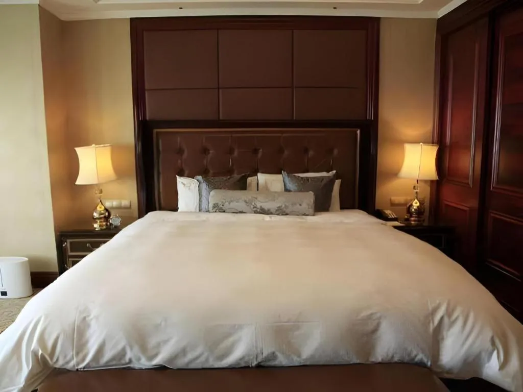 Bed in Beijing Liaoning Hotel