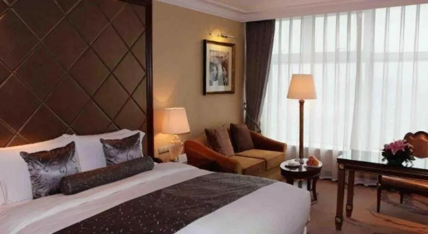 Bed in Beijing Liaoning Hotel