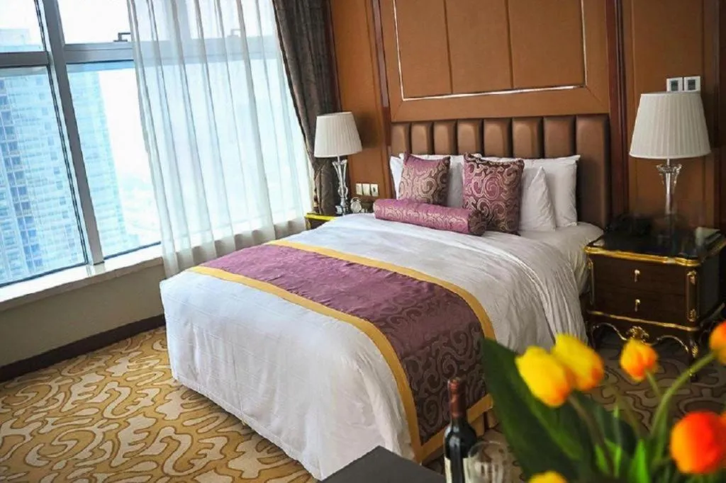 Bed in Beijing Liaoning Hotel