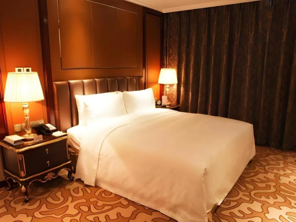 Bed in Beijing Liaoning Hotel