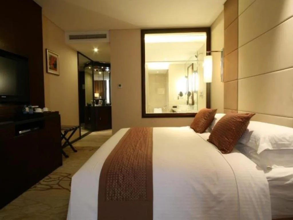 Bed in Beijing Liaoning Hotel