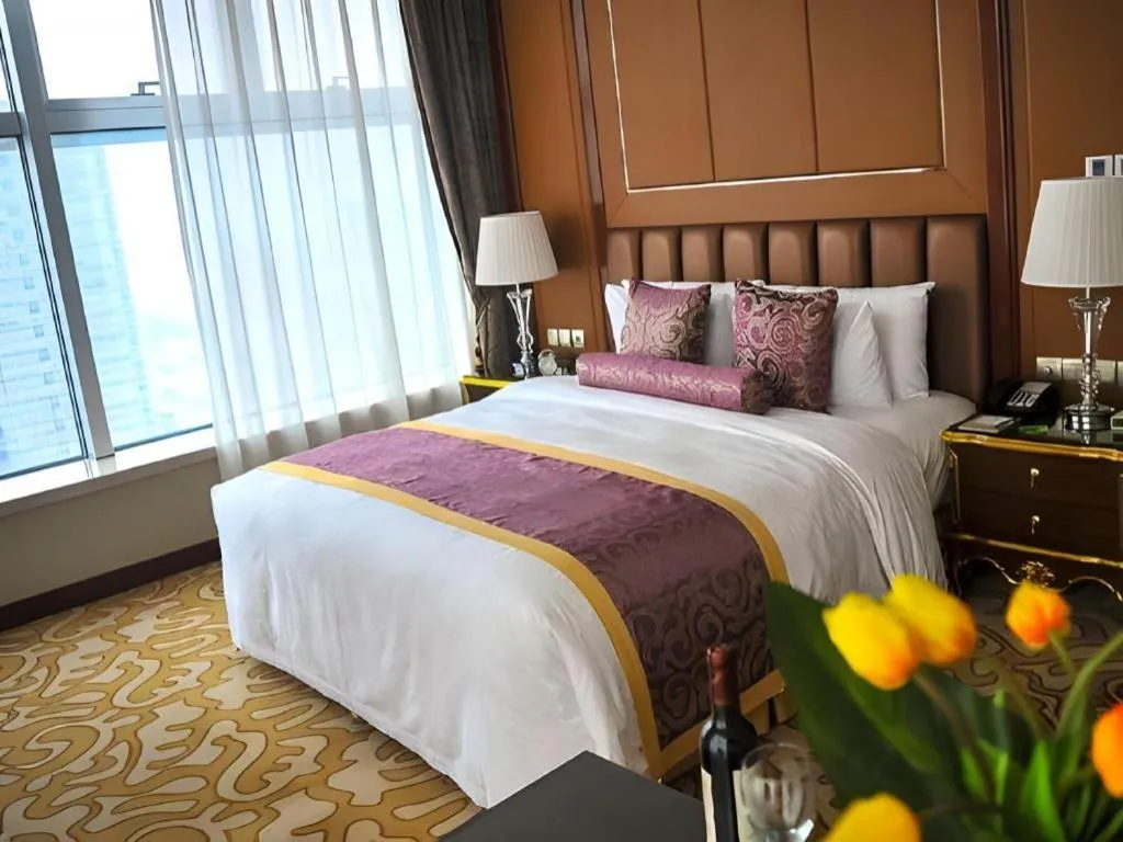 Bed in Beijing Liaoning Hotel