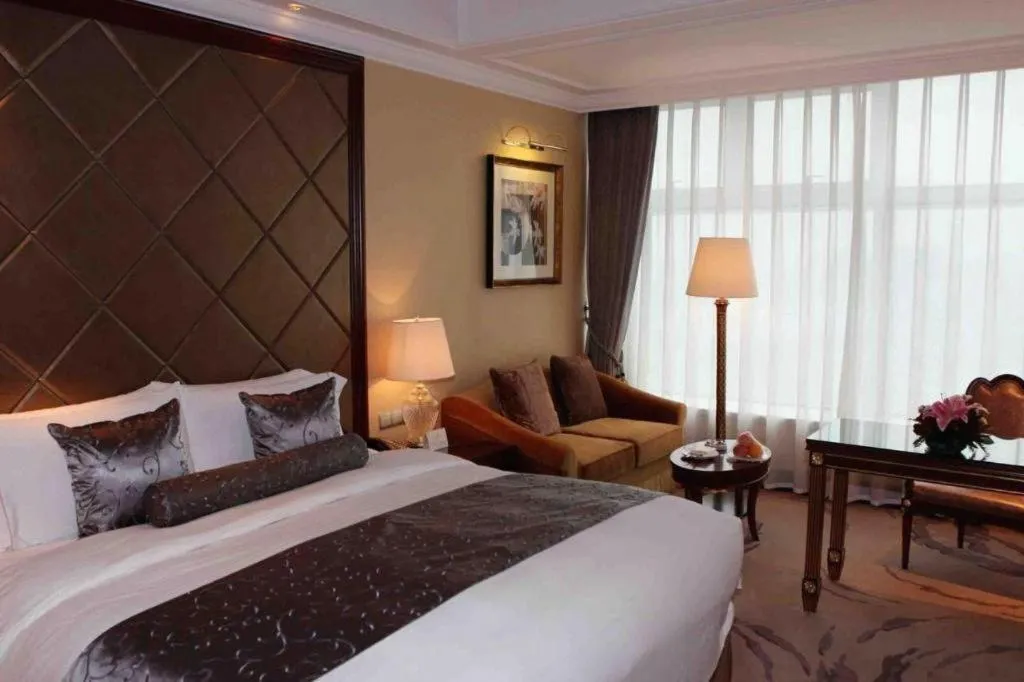 Bed in Beijing Liaoning Hotel