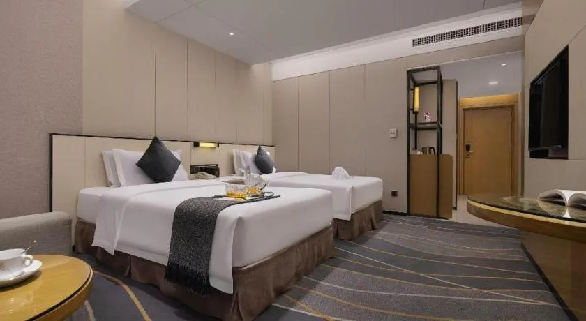 Bed in Changsha Huatian Hotel