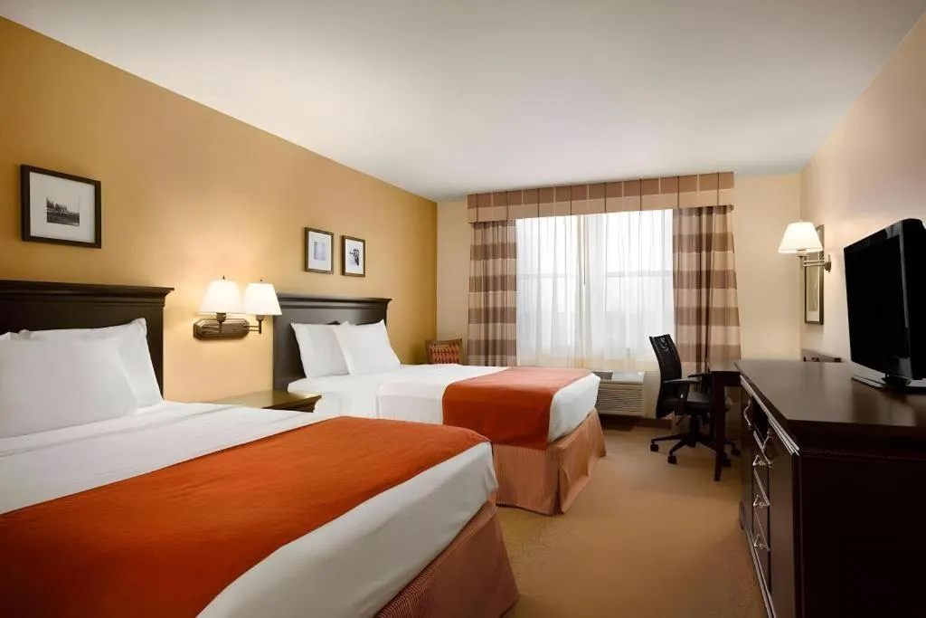 Bed in Country Inn & Suites by Radisson, Dundee, MI