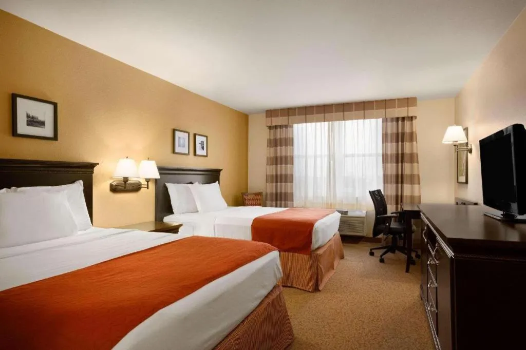 Bed in Country Inn & Suites by Radisson, Dundee, MI