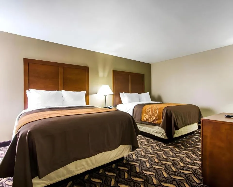 Bed in AmericInn by Wyndham Memphis East