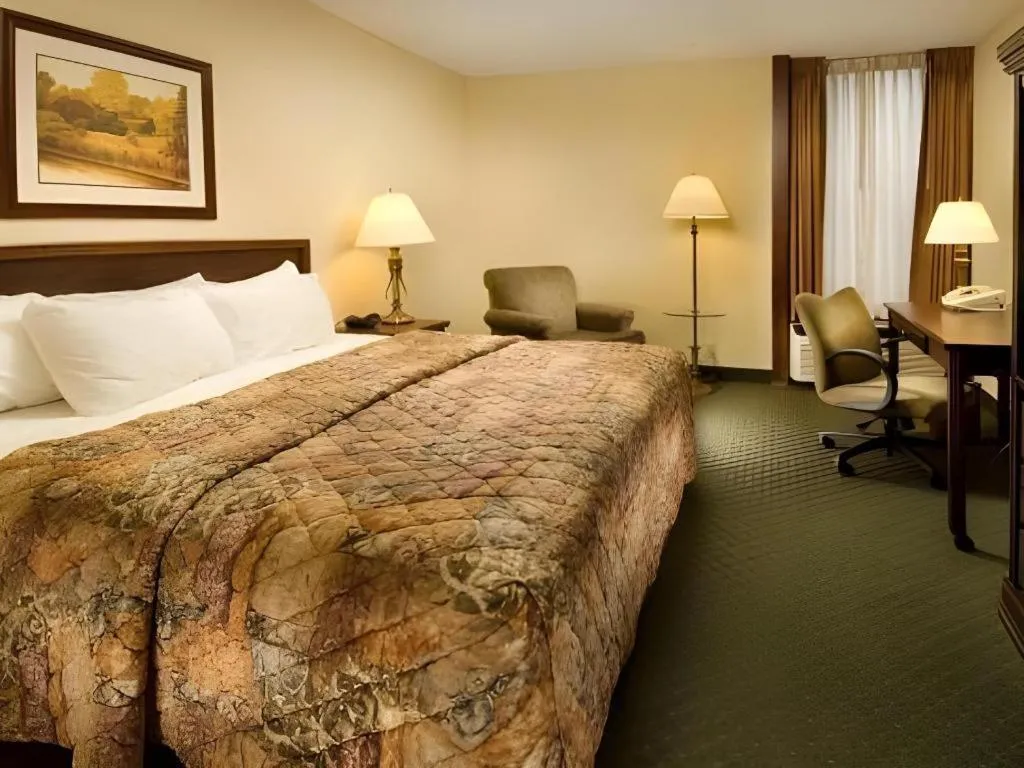 Bed in AmericInn by Wyndham Memphis East