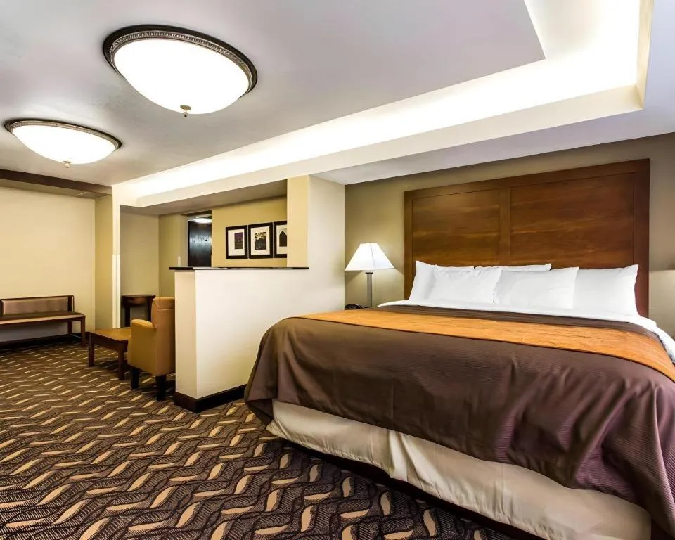 Bed in AmericInn by Wyndham Memphis East