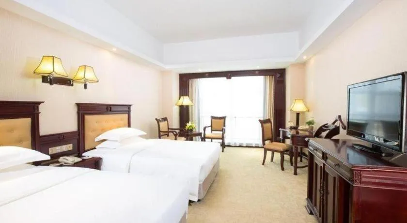 Bed in Changsha Mingchen International Hotel