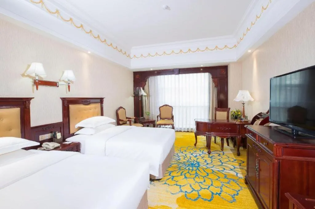 Bed in Changsha Mingchen International Hotel