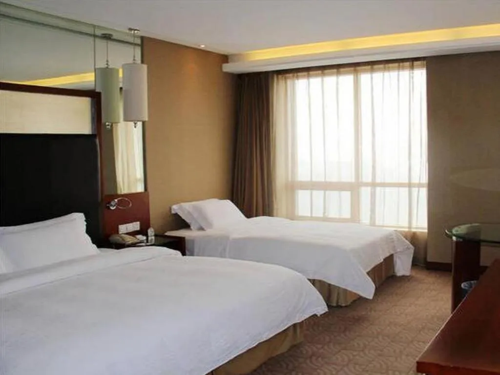 Bed in Changsha Xiaoxiang Huatian Hotel