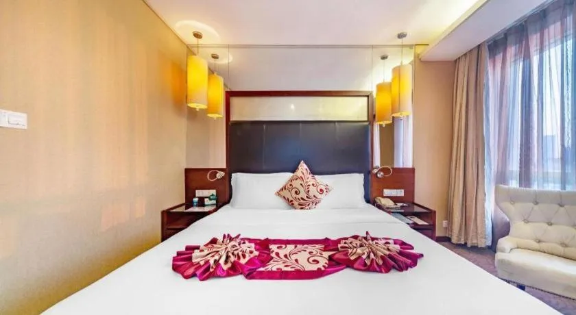 Bed in Changsha Xiaoxiang Huatian Hotel