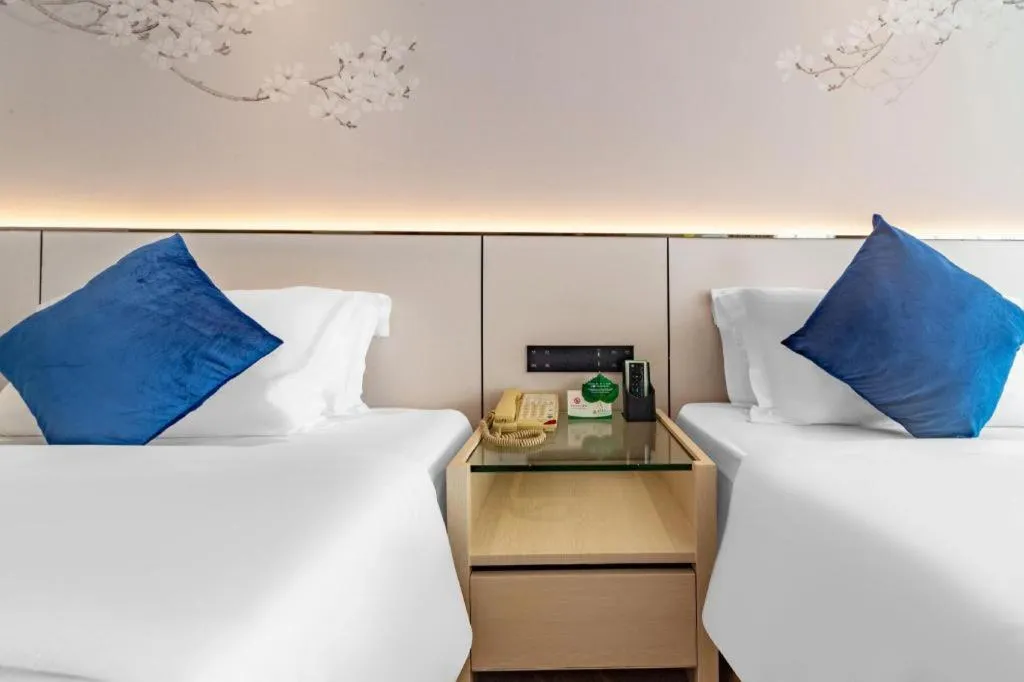 Bed in Changsha Xiaoxiang Huatian Hotel