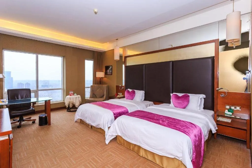 Bed in Changsha Xiaoxiang Huatian Hotel