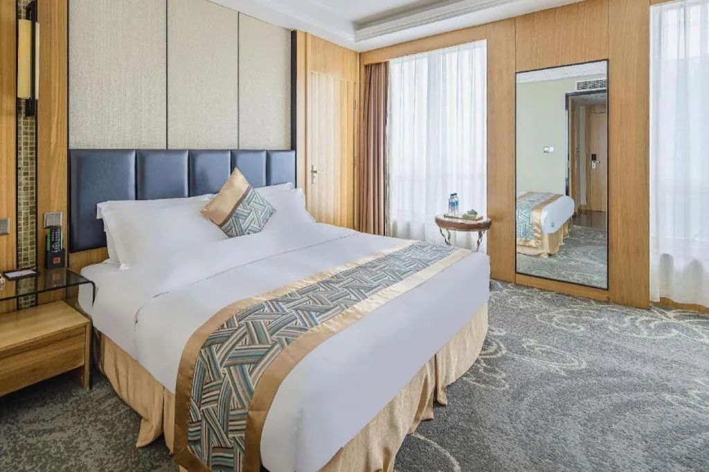 Bed in Changsha Xiaoxiang Huatian Hotel