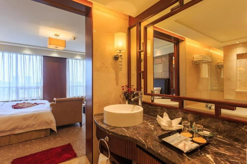 Bed in Changsha Xiaoxiang Huatian Hotel