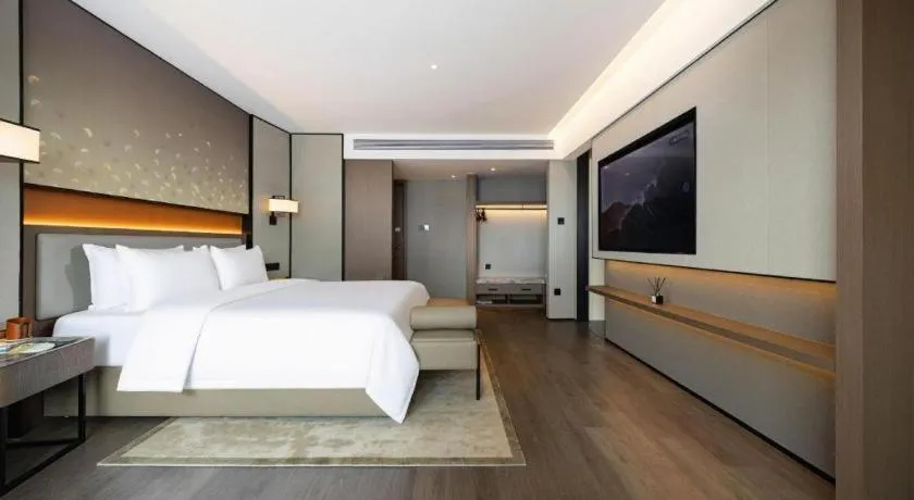 Bed in Changsha Xiaoxiang Huatian Hotel