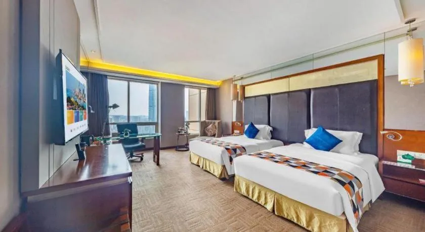 Bed in Changsha Xiaoxiang Huatian Hotel