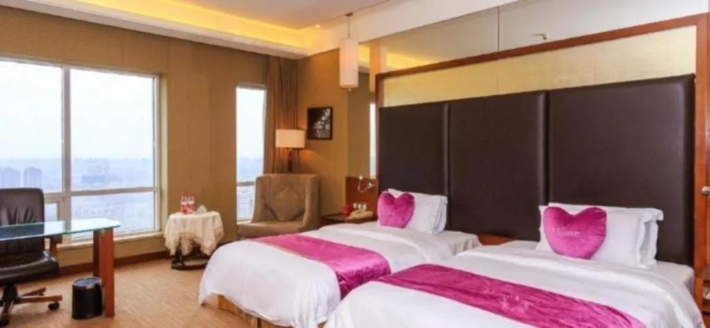 Bed in Changsha Xiaoxiang Huatian Hotel