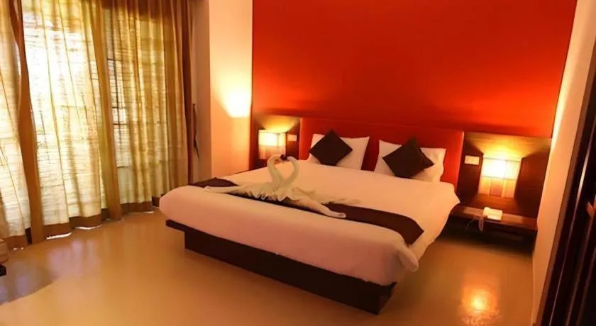 Bed in PhoomThai Garden Hotel