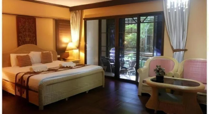 Bed in PhoomThai Garden Hotel