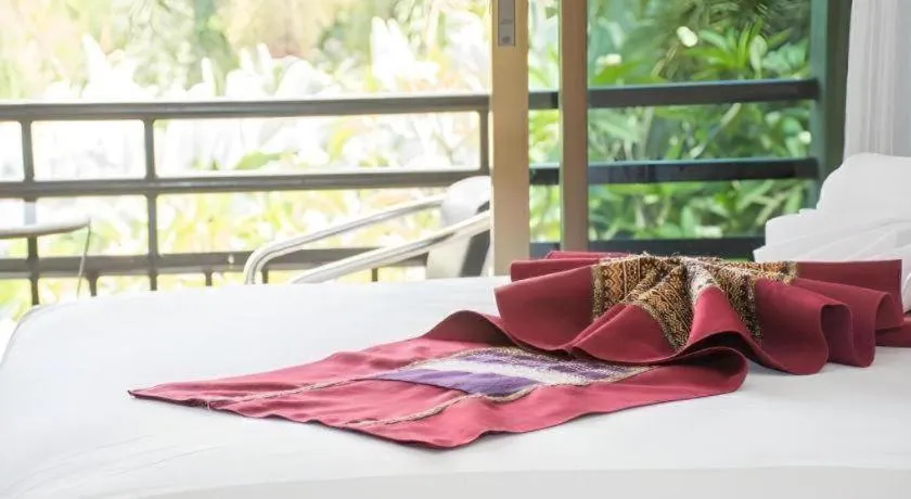 Bed in PhoomThai Garden Hotel