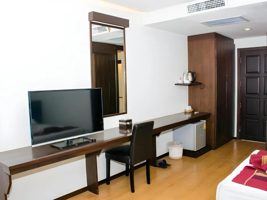 Bed in PhoomThai Garden Hotel