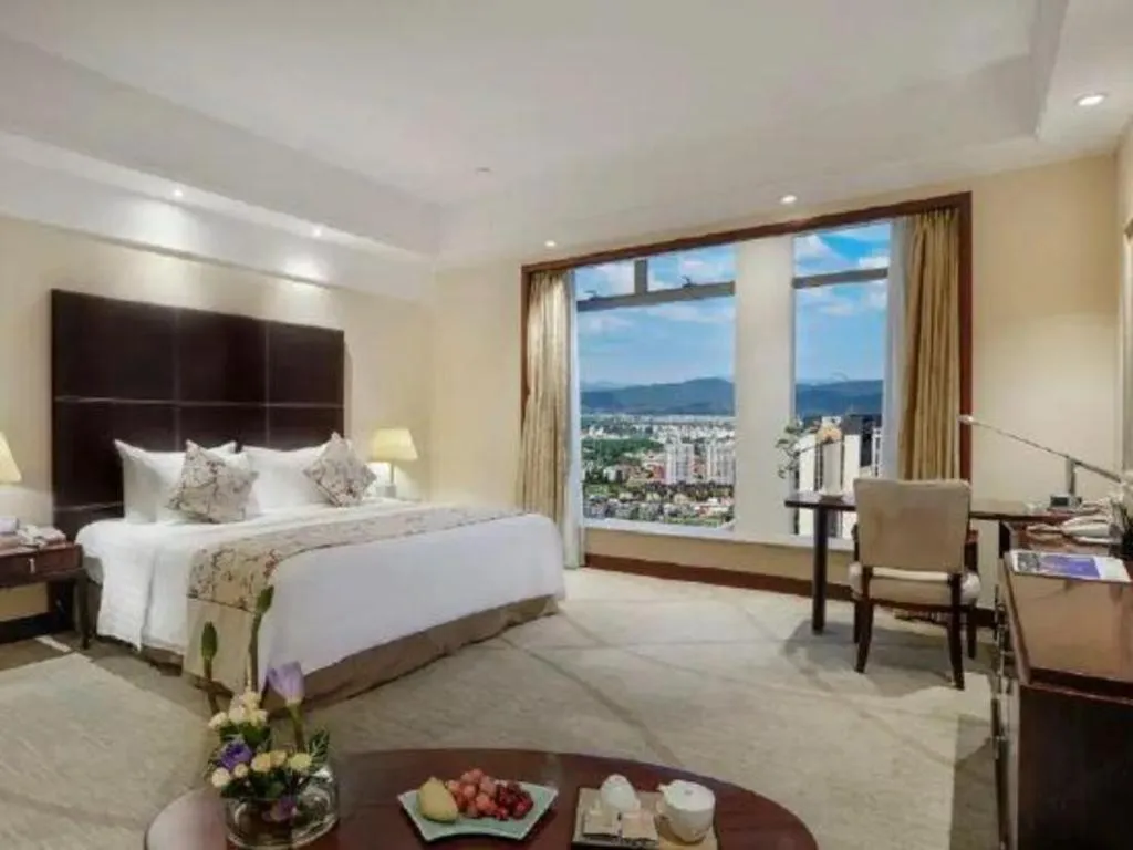 Bed in New Century Grand Hotel Zhuji Yaojiang