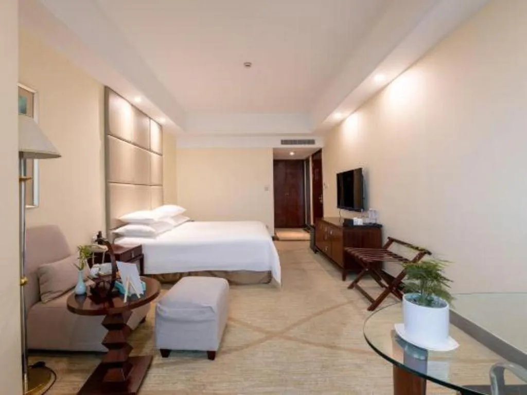 Bed in New Century Grand Hotel Zhuji Yaojiang