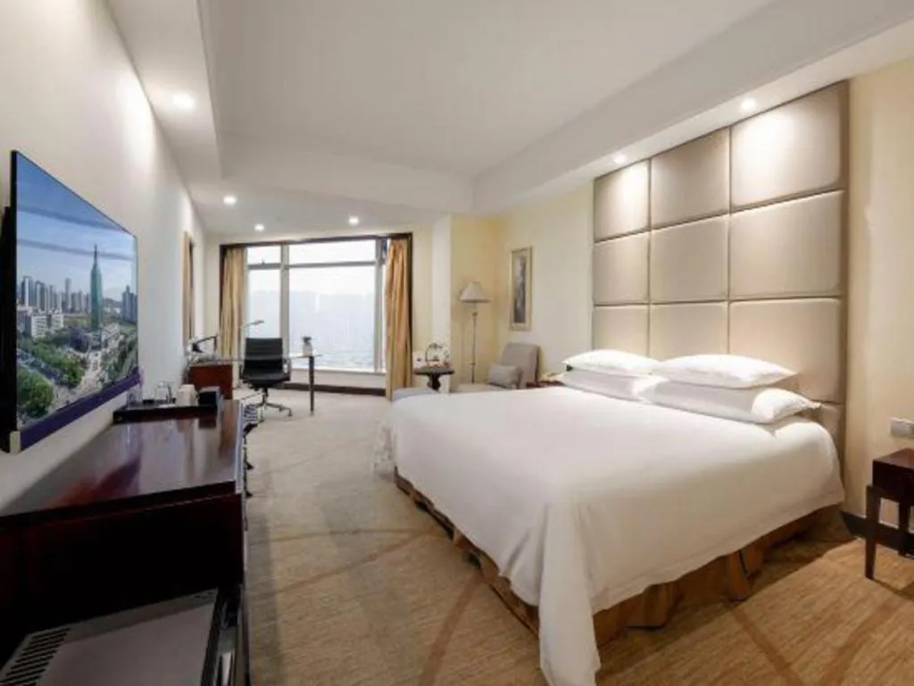 Bed in New Century Grand Hotel Zhuji Yaojiang